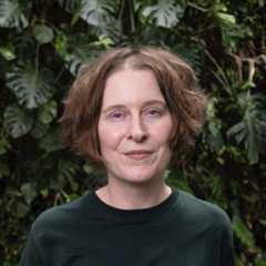 Jennifer Gabrys against a backdrop of rainforest plants